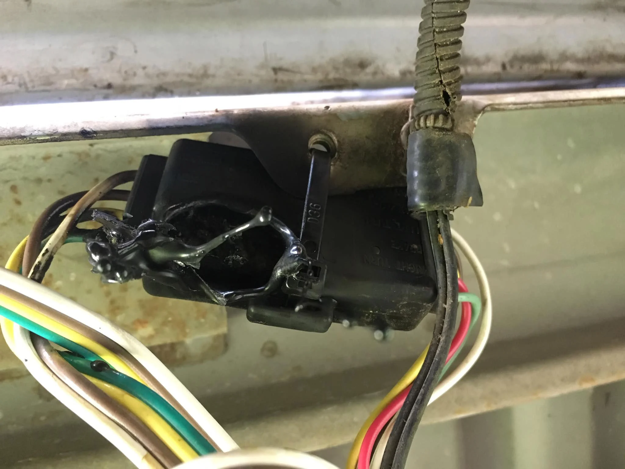 This 12 volt connector on a trailer heated up and the owners saw it smoking and caught it before it became a fire.