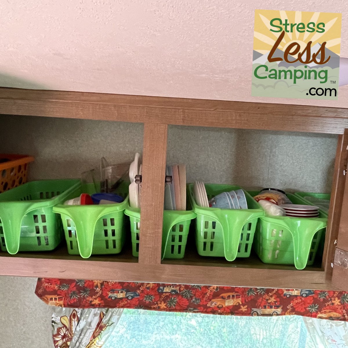 Plastic baskets organize dishes in RV cabinet