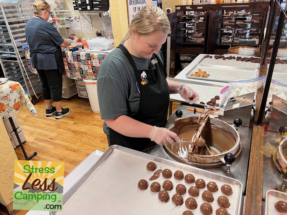 Liz Wood, owner of the Chocolate Haus, makes sure the inventory is up to her standards.jpg