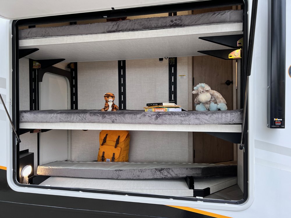 The reconfigurable bunk-office-cargo bay of the Ember E-Series 2