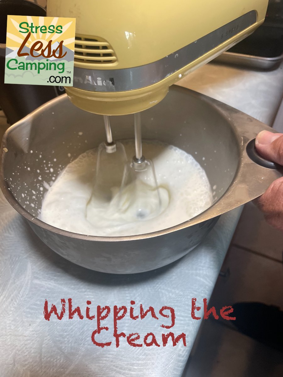 Whipping heavy cream for the peanut butter pie filling.jpg