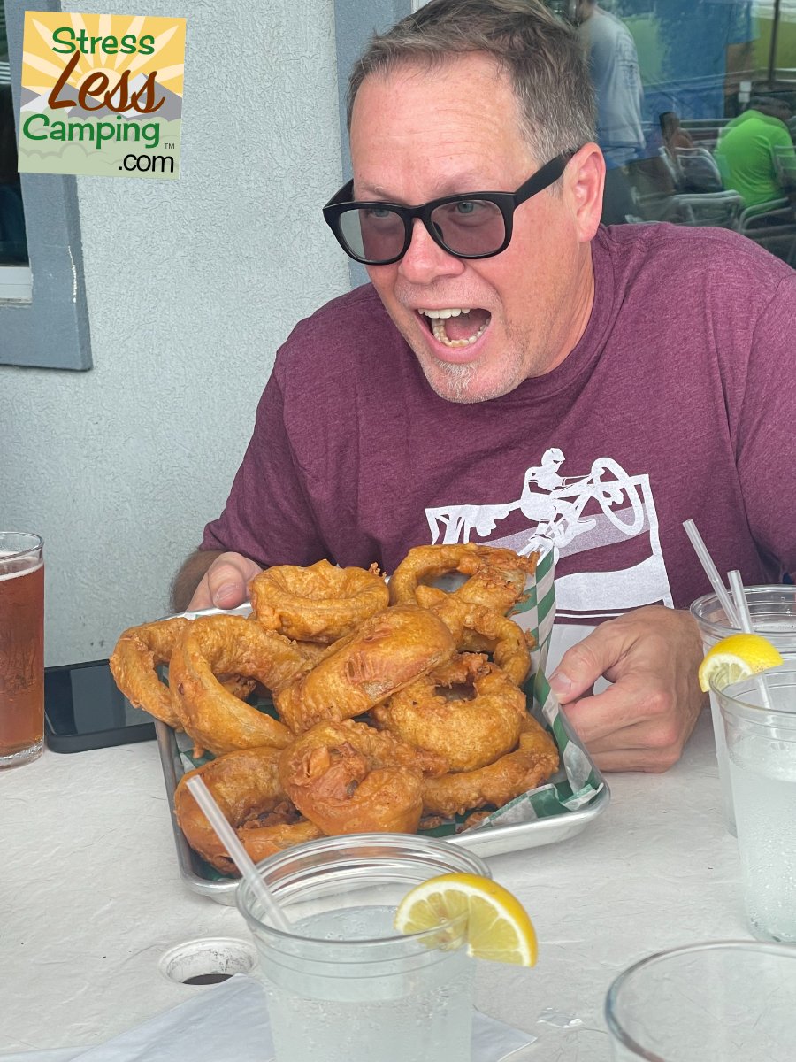 Spencer approves of onion rings almost as big as his head at Bubba's Brew