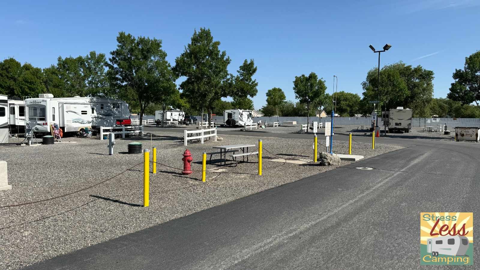 A few RVs including ours in the pull-through sites at Clark RV Park in Battle Mountain Nevada.jpg