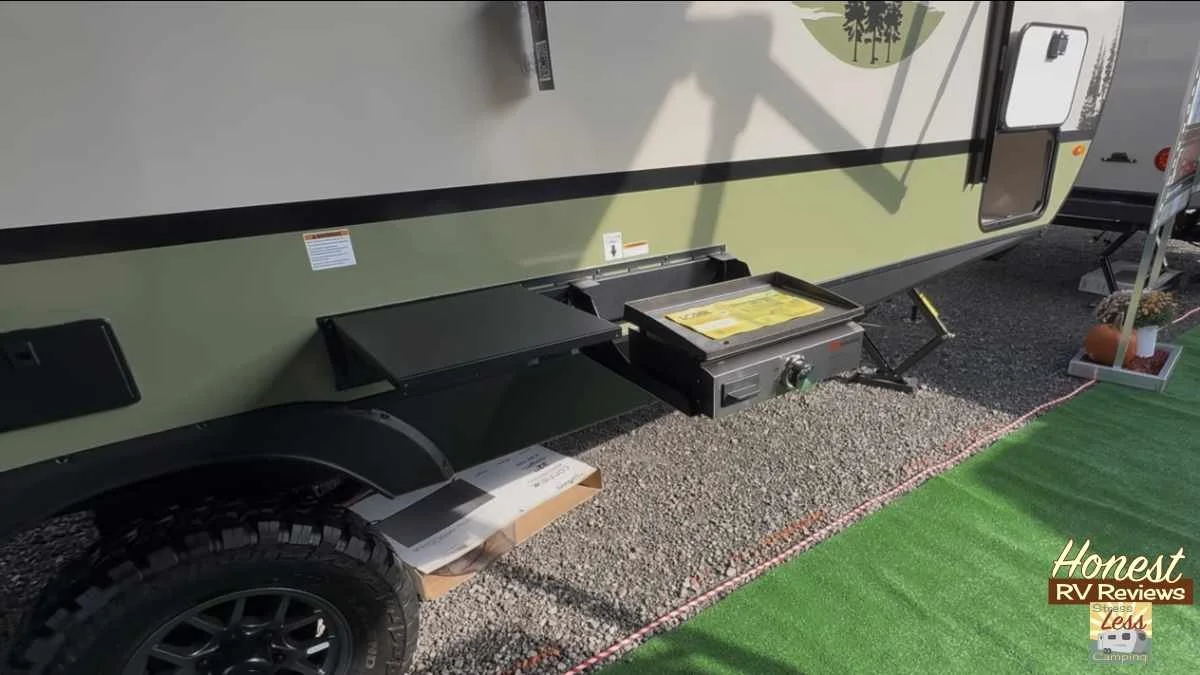 A flat-top griddle and metal table on a rail outside the NoBo 18.2.jpg