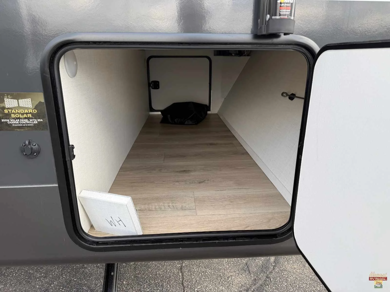 Large pass-through storage that's nicely finished in the Rockwood Mini Lite 2525RB.jpg