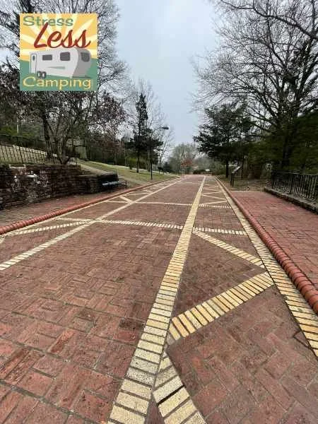 The Grand Prmoenade is a red and yellow brick road that follows the hillside behind the bathhouses in Hot Springs National Park, Arkansas.