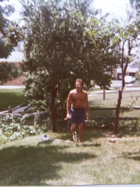 Dad in the backyard in Englewood Ohio, planning yet another garden bed