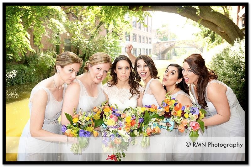 a nutty bunch of bridesmaids and bride and their colorful early spring bouquets