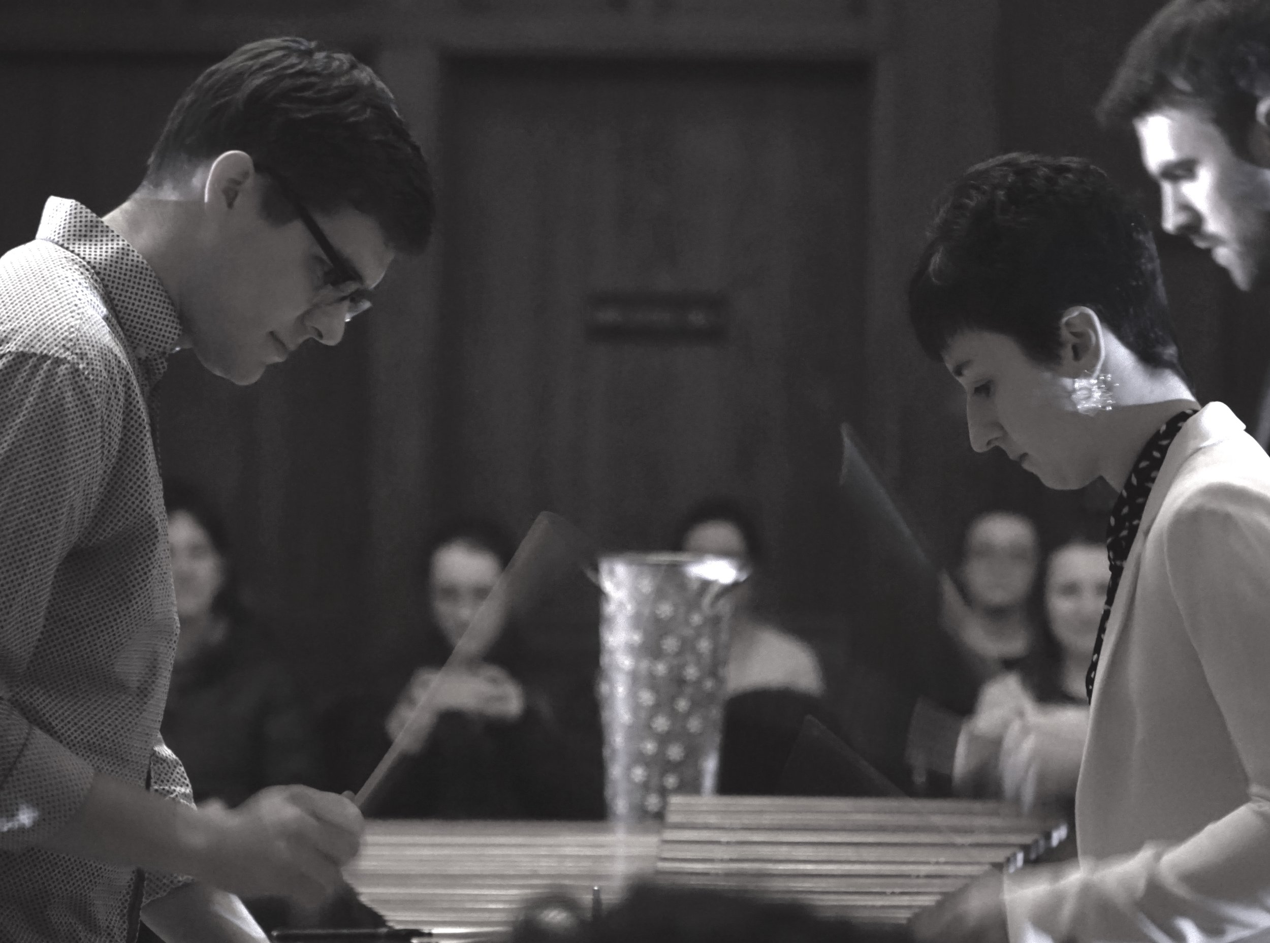 two people, one instrument