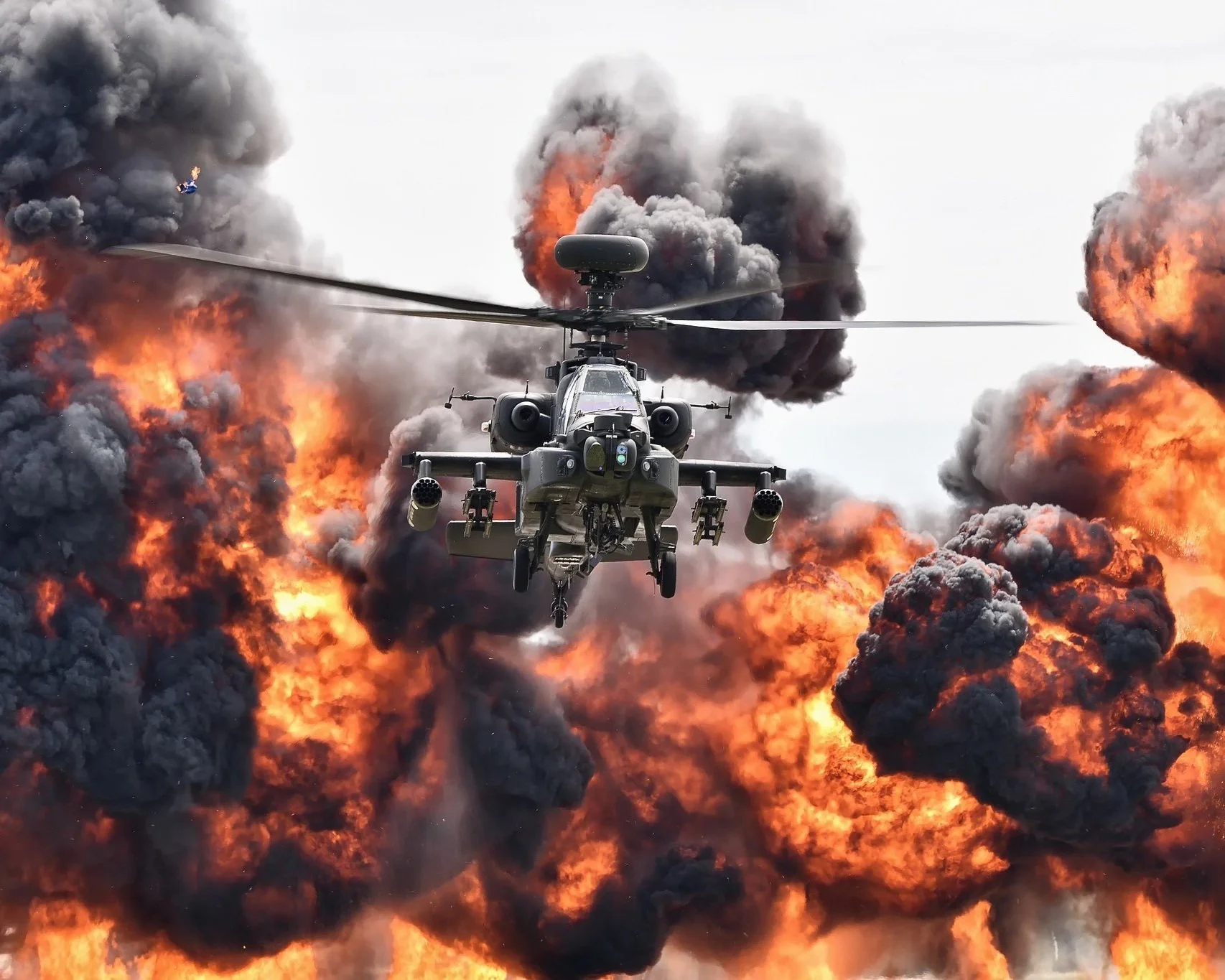 AH-64 Apache helicopter with explosion