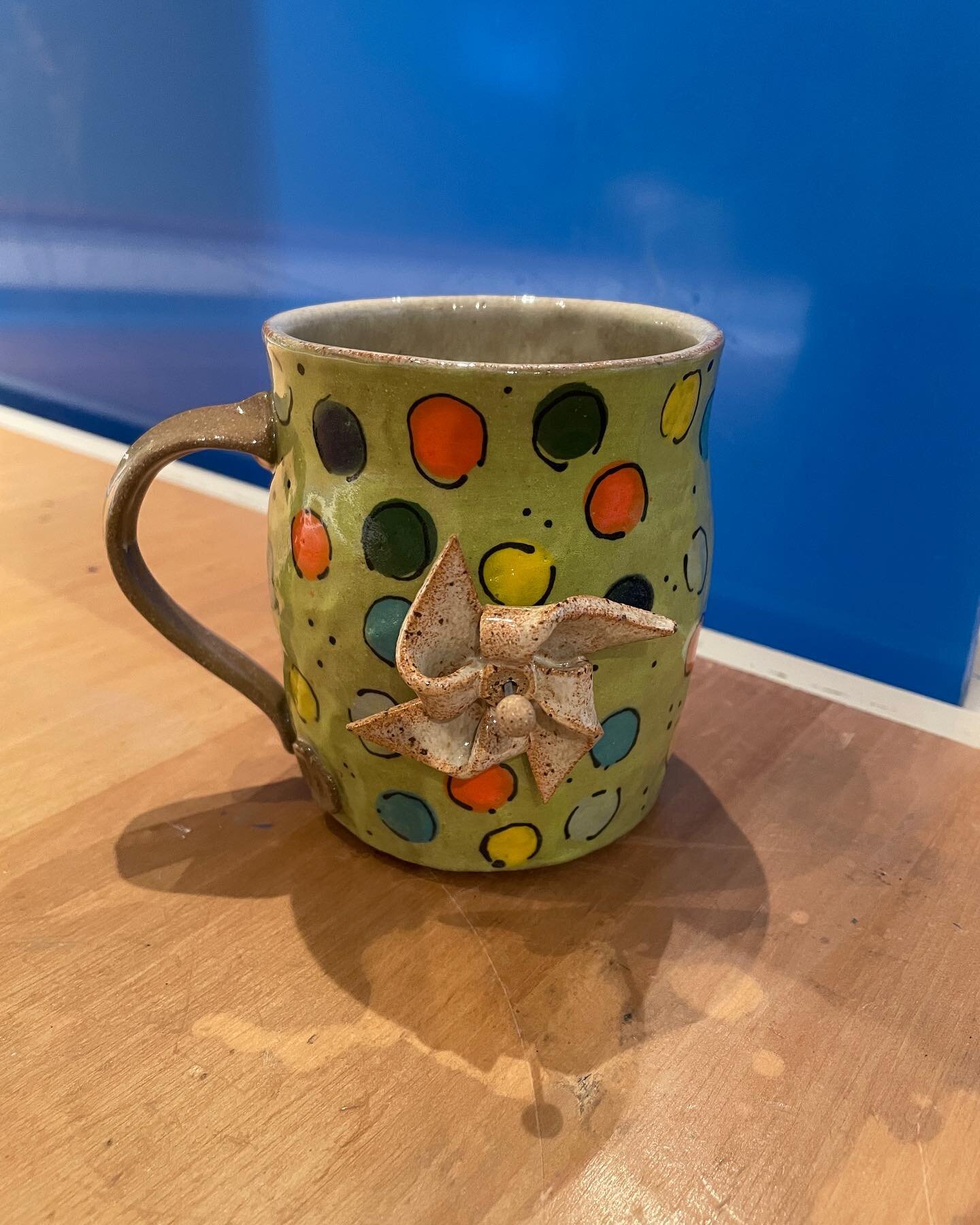 Very excited to have received my mug made by @kilnfag. Lime green with polka dots, AND a pinwheel that spins?!!! Love, love, love!!! 💕💚💕