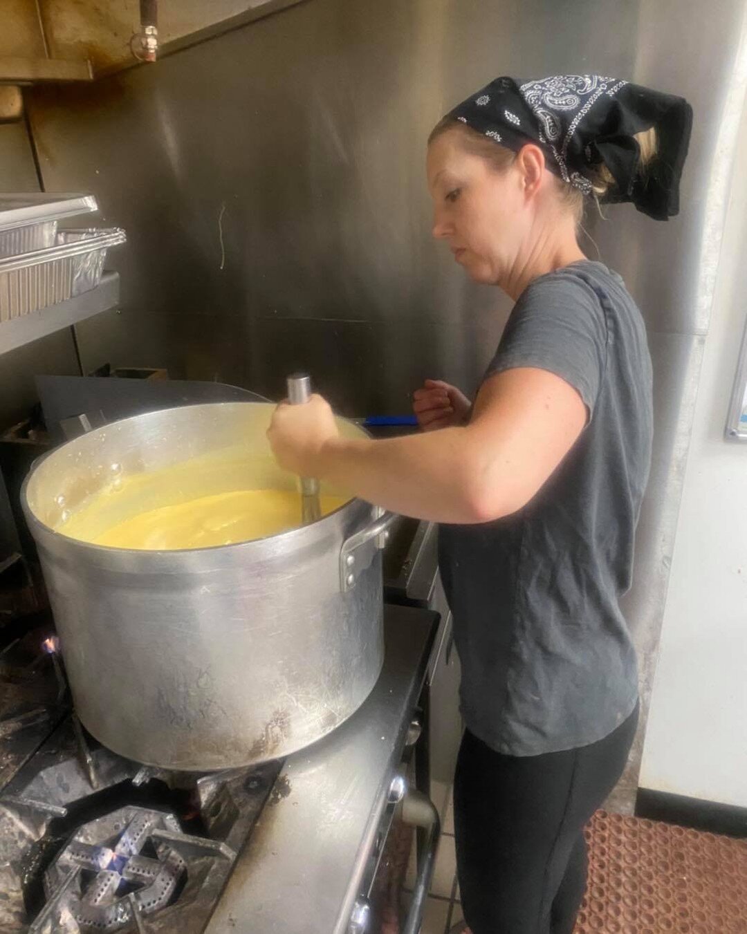 Boss woman getting her cauldron of Mac and cheese ready.