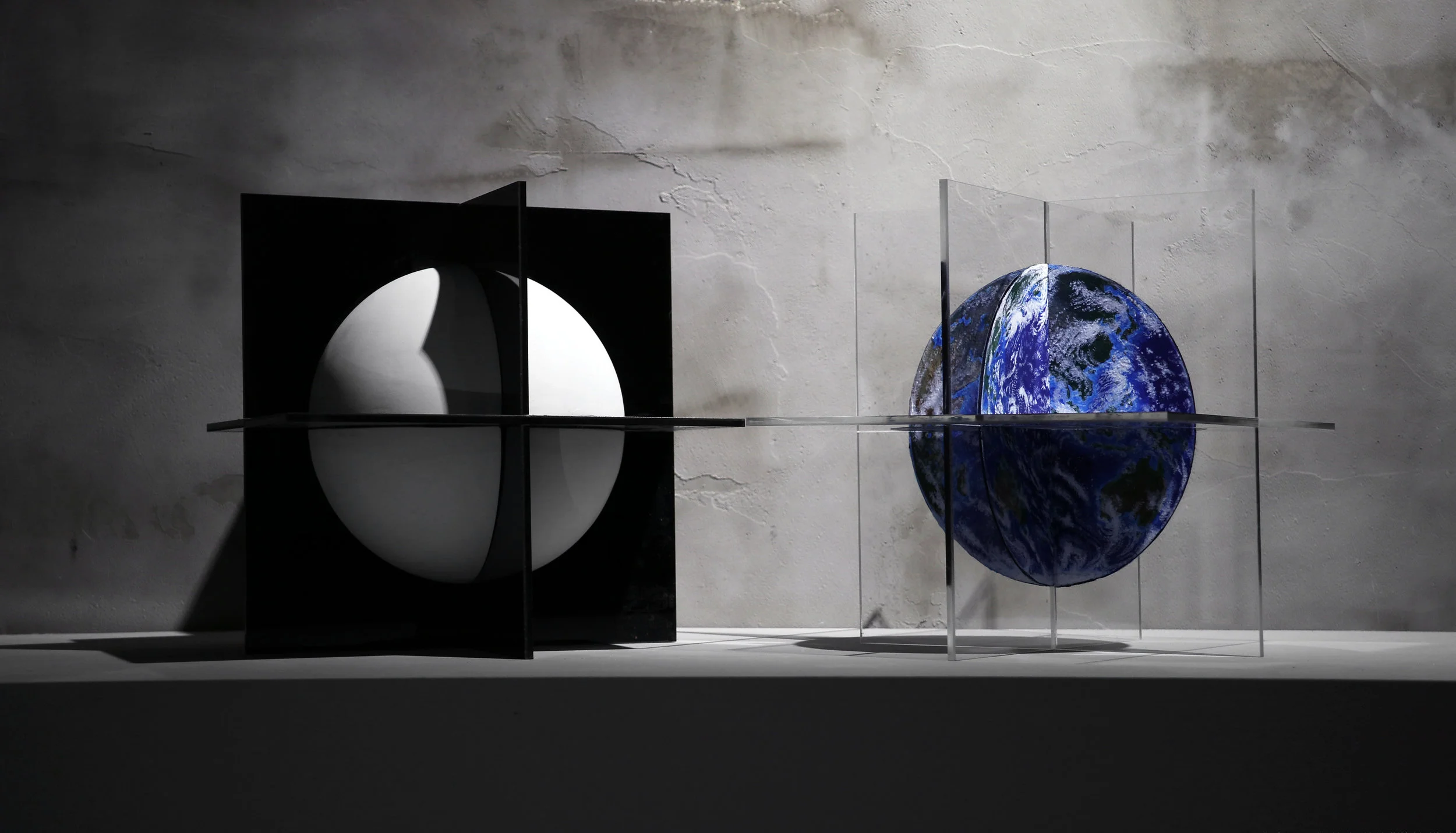   Two Spheres (plaster and acrylic on plexiglas)  
