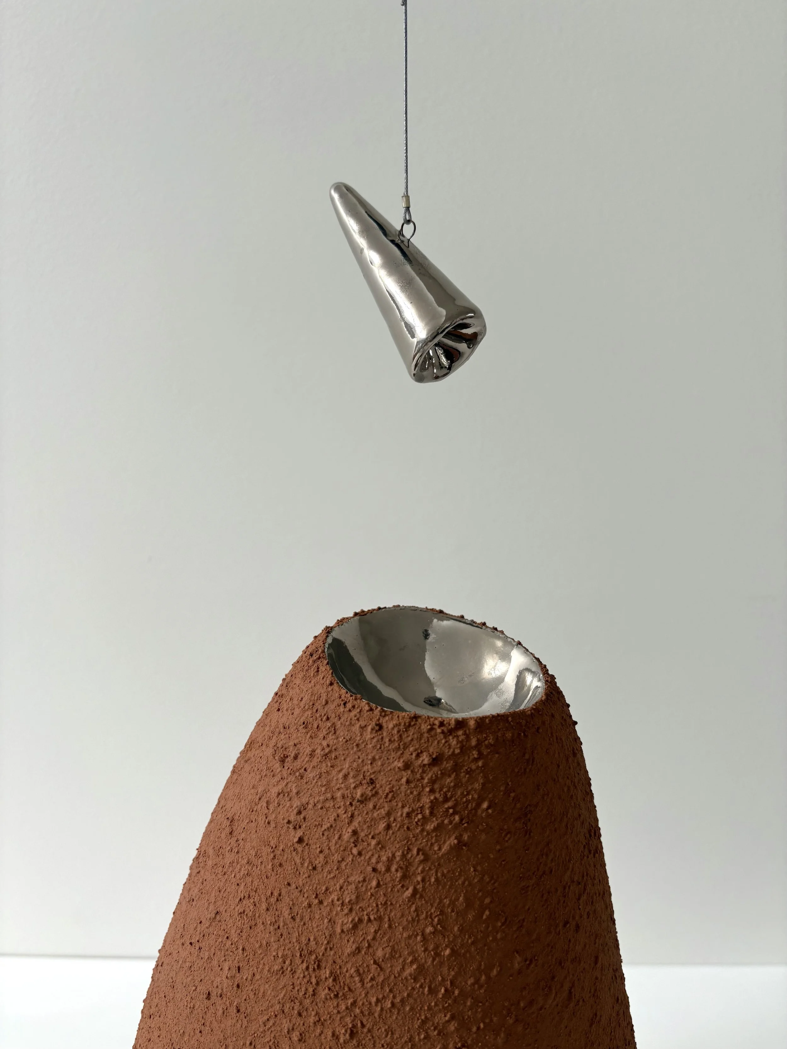 Neech_Britt_Single form (reflection stone with hanging elements)_Detail.jpeg