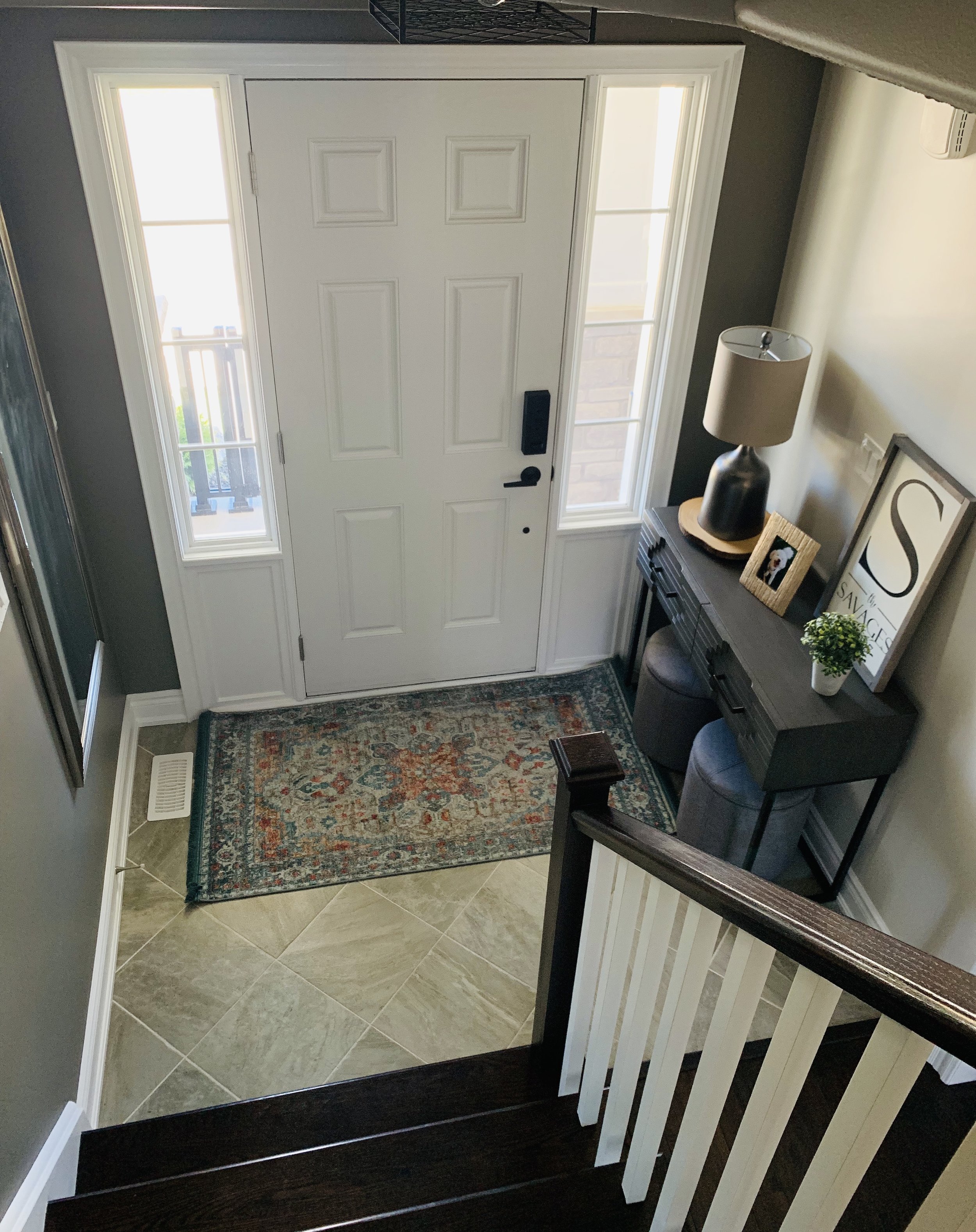You can see in this photo where we transitioned from “Off White” to “Wet Cement” and carried it up the stairs and into the loft