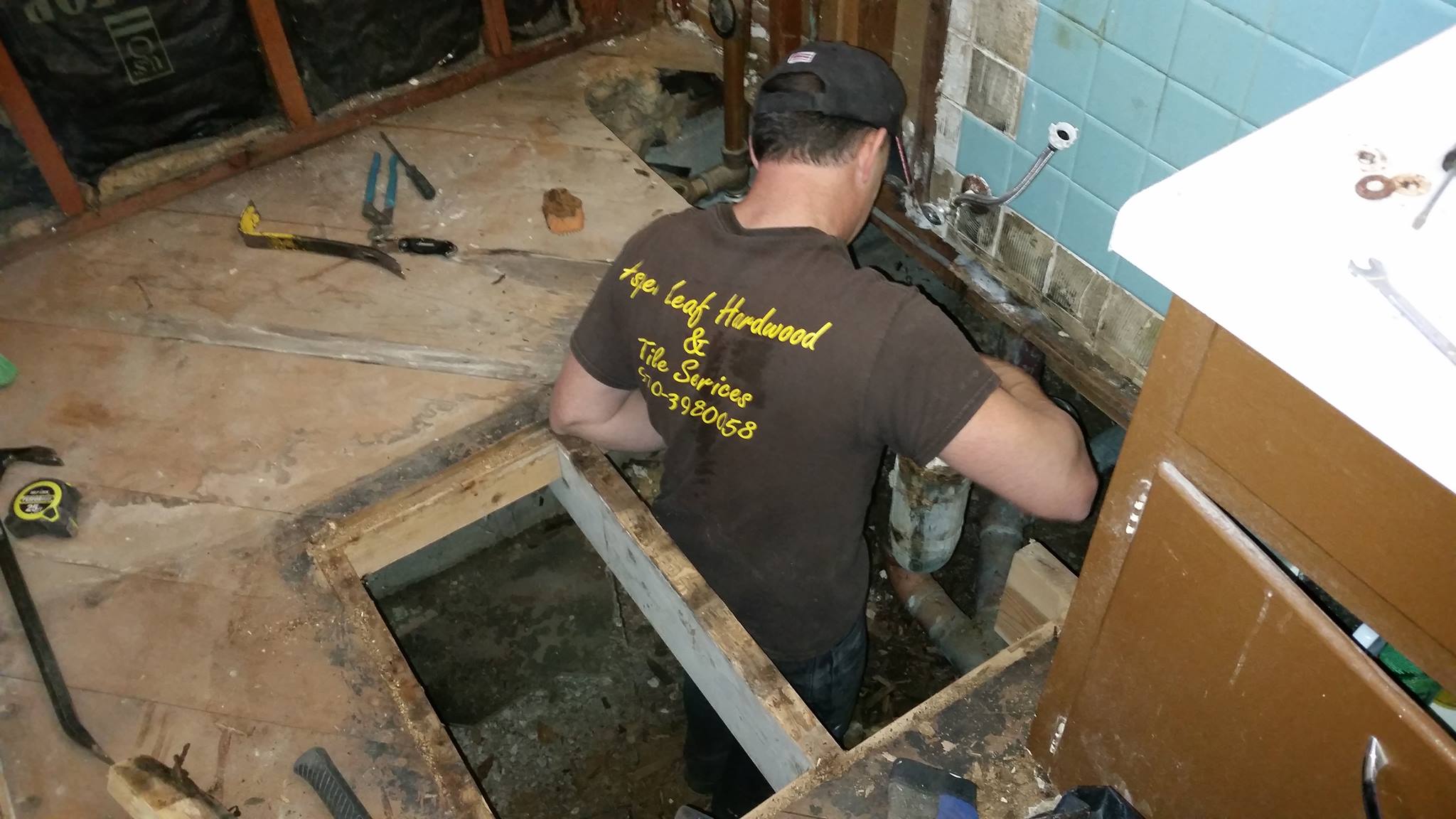 Aspen Leaf J standing in hole in floor.jpg