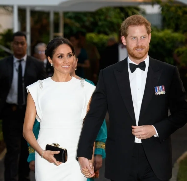 An evening function in Tonga she wore a Theia Gown. Dress: US$895