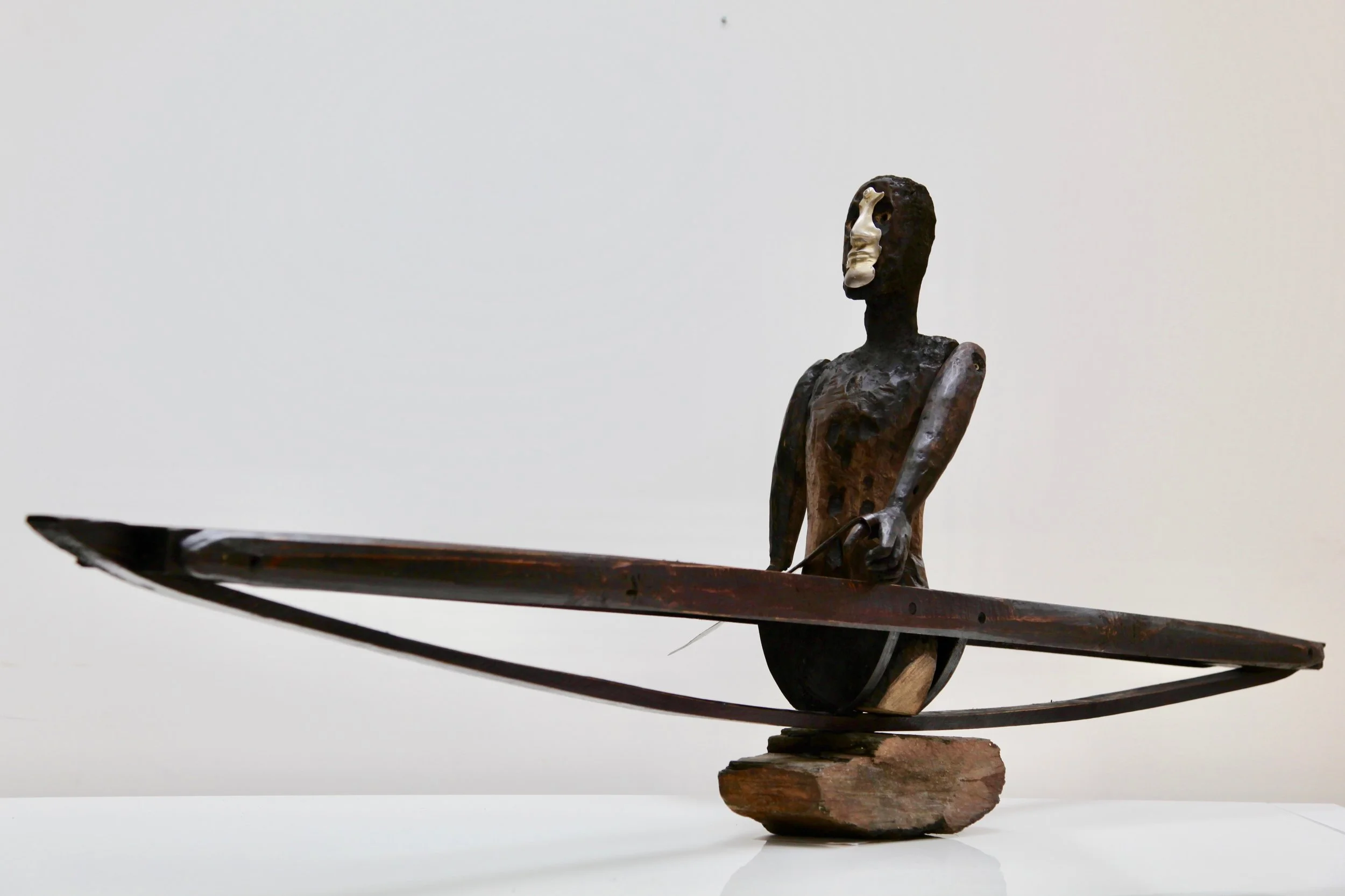  Ancestor 2021 71 H x 198 L x 41 D CM Carved, painted and burned wood, steel, pewter and stone 