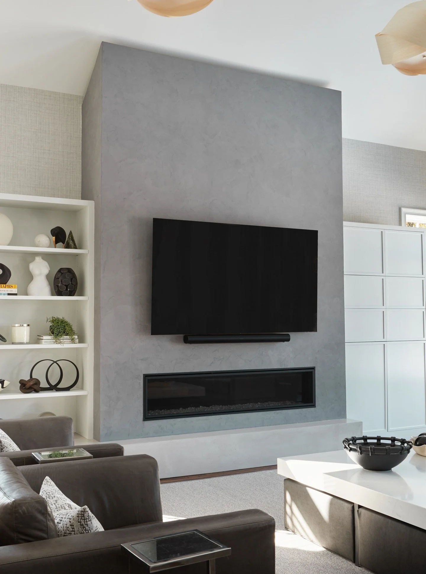 @portolapaints Roman Clay adds so much dimension to this TV and fireplace column. Paint would not have had nearly the same impact.

Hearth @concreteencounter 
Photography @joebuzzeophoto Architect and Construction: @theodellgrp