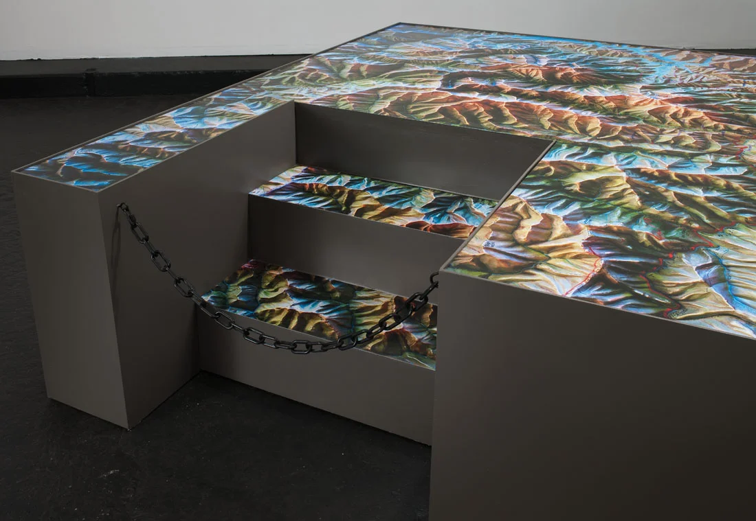 Trinity , 2011 Wood, paint, chain, and photographs 80 x 80 x 40 inches ————