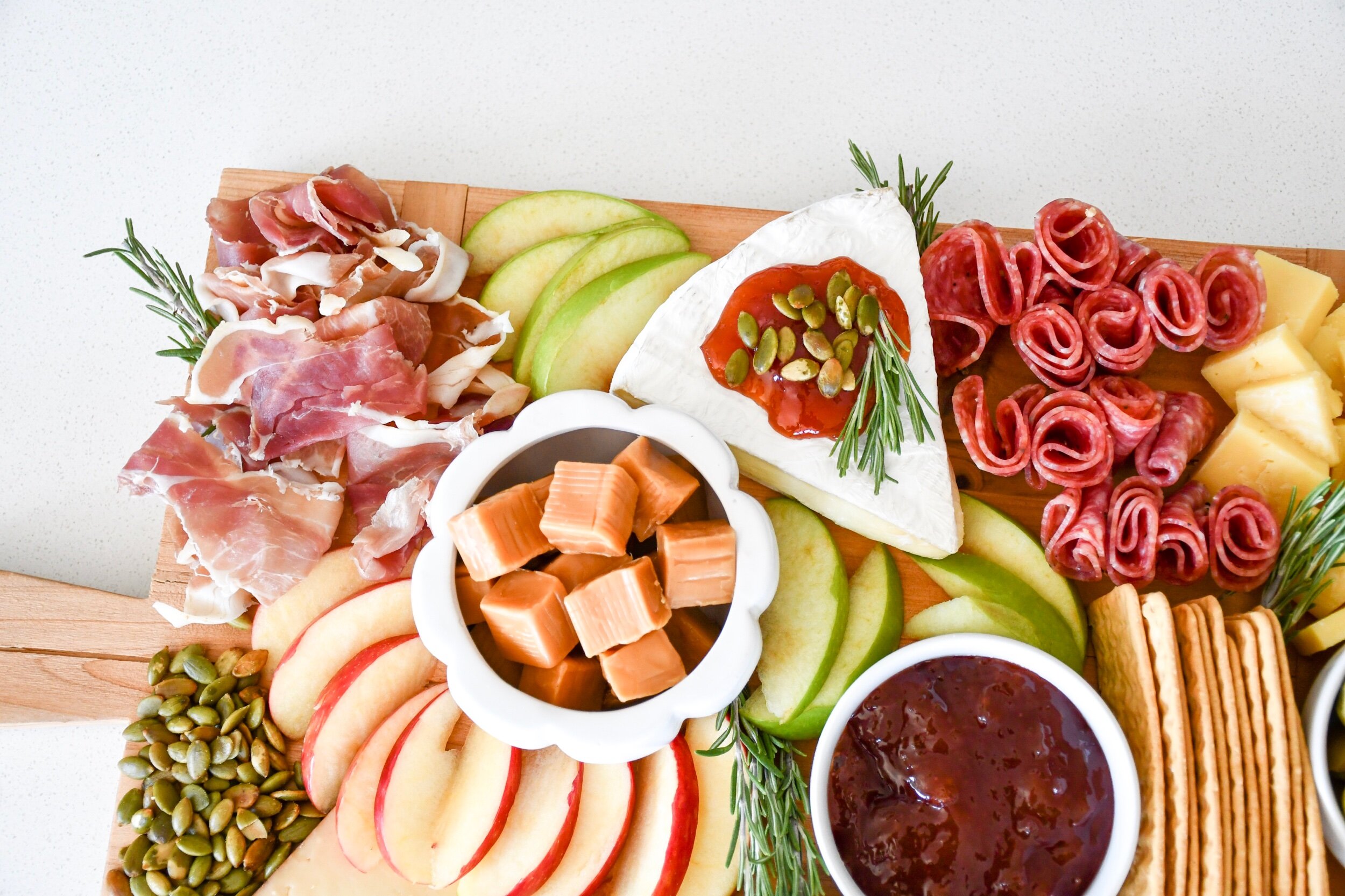 Fall Inspired Charcuterie Board | tarynintotravel.com |  #cheeseboard #partyfood #foodcenterpiece #charcuterieboard