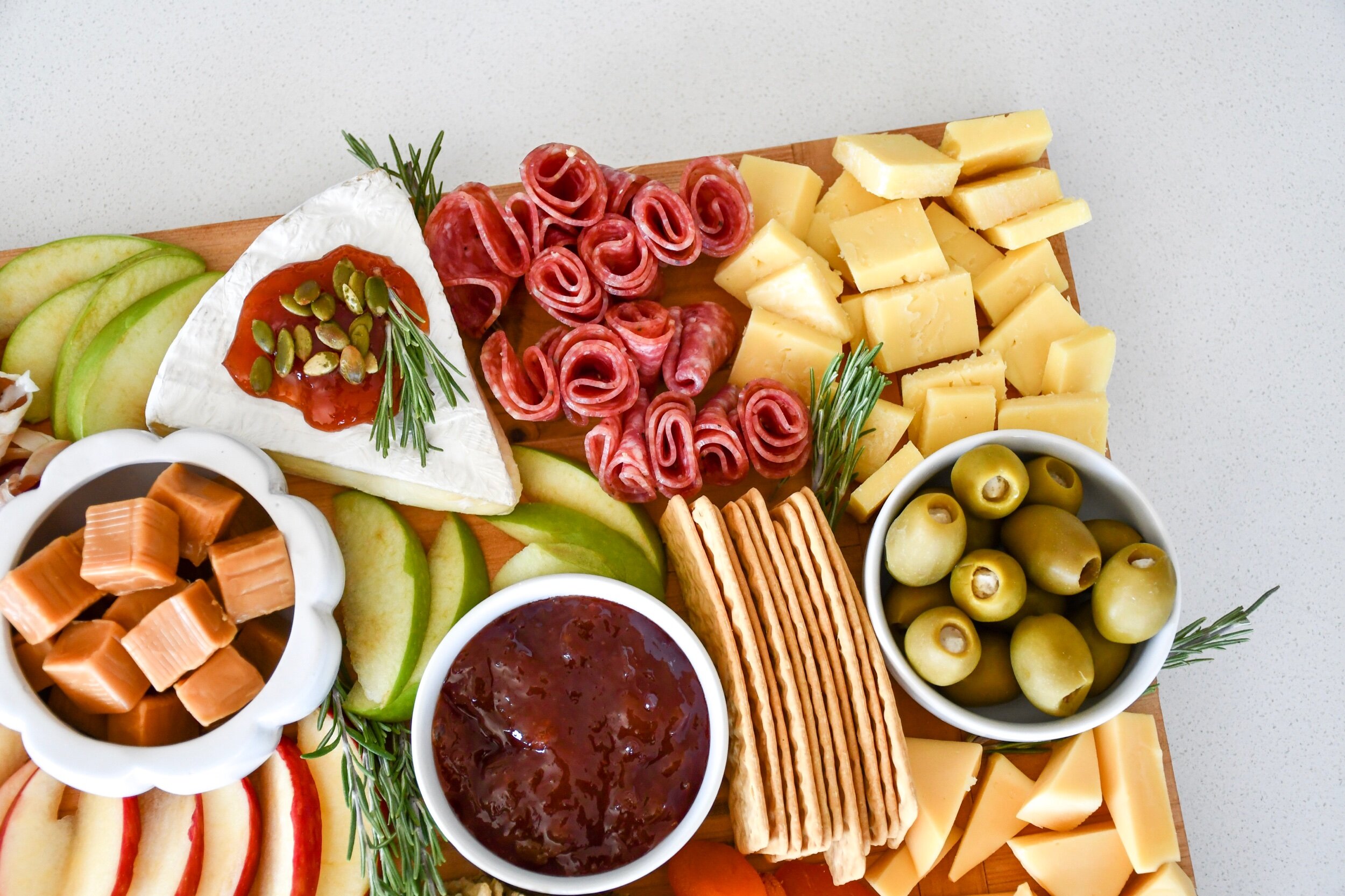 Fall Inspired Charcuterie Board | tarynintotravel.com |  #cheeseboard #partyfood #foodcenterpiece #charcuterieboard