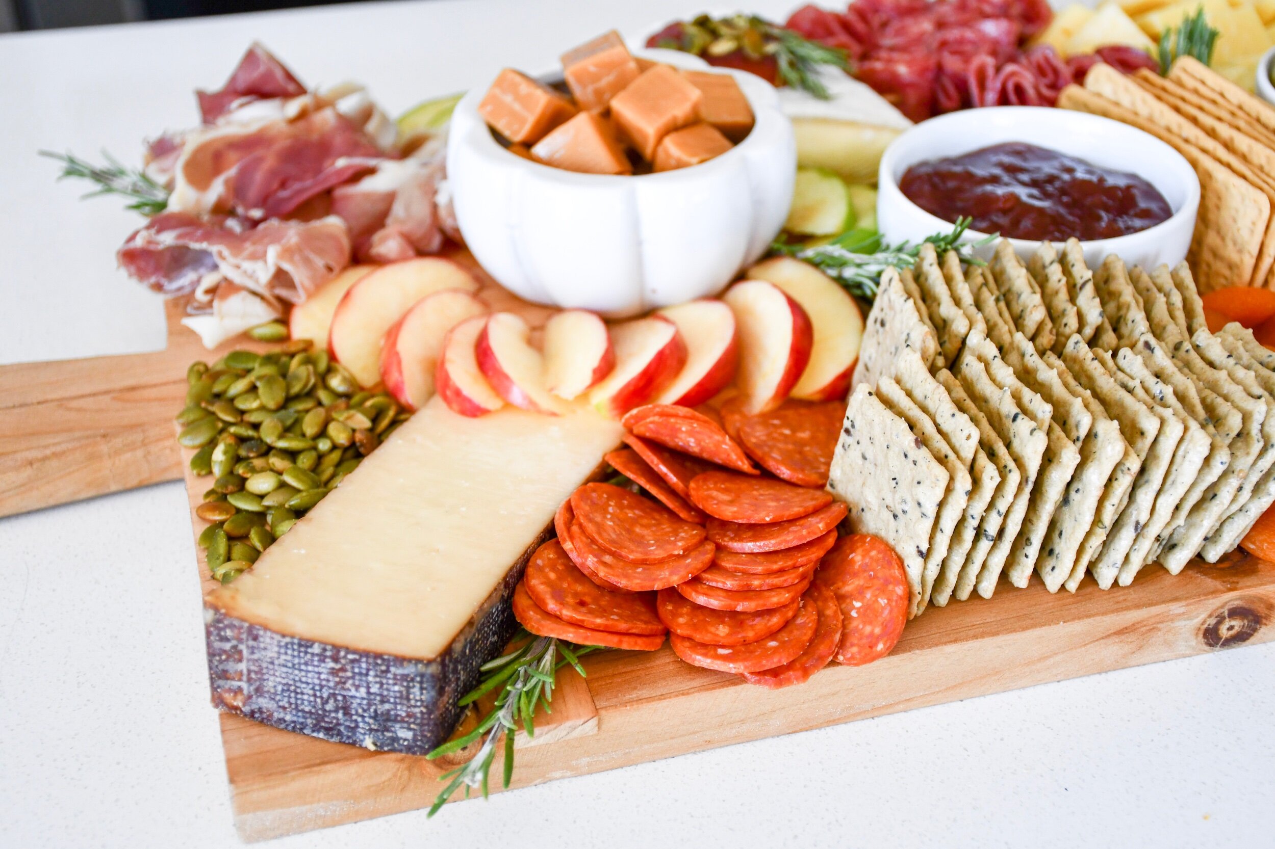 Fall Inspired Charcuterie Board | tarynintotravel.com |  #cheeseboard #partyfood #foodcenterpiece #charcuterieboard