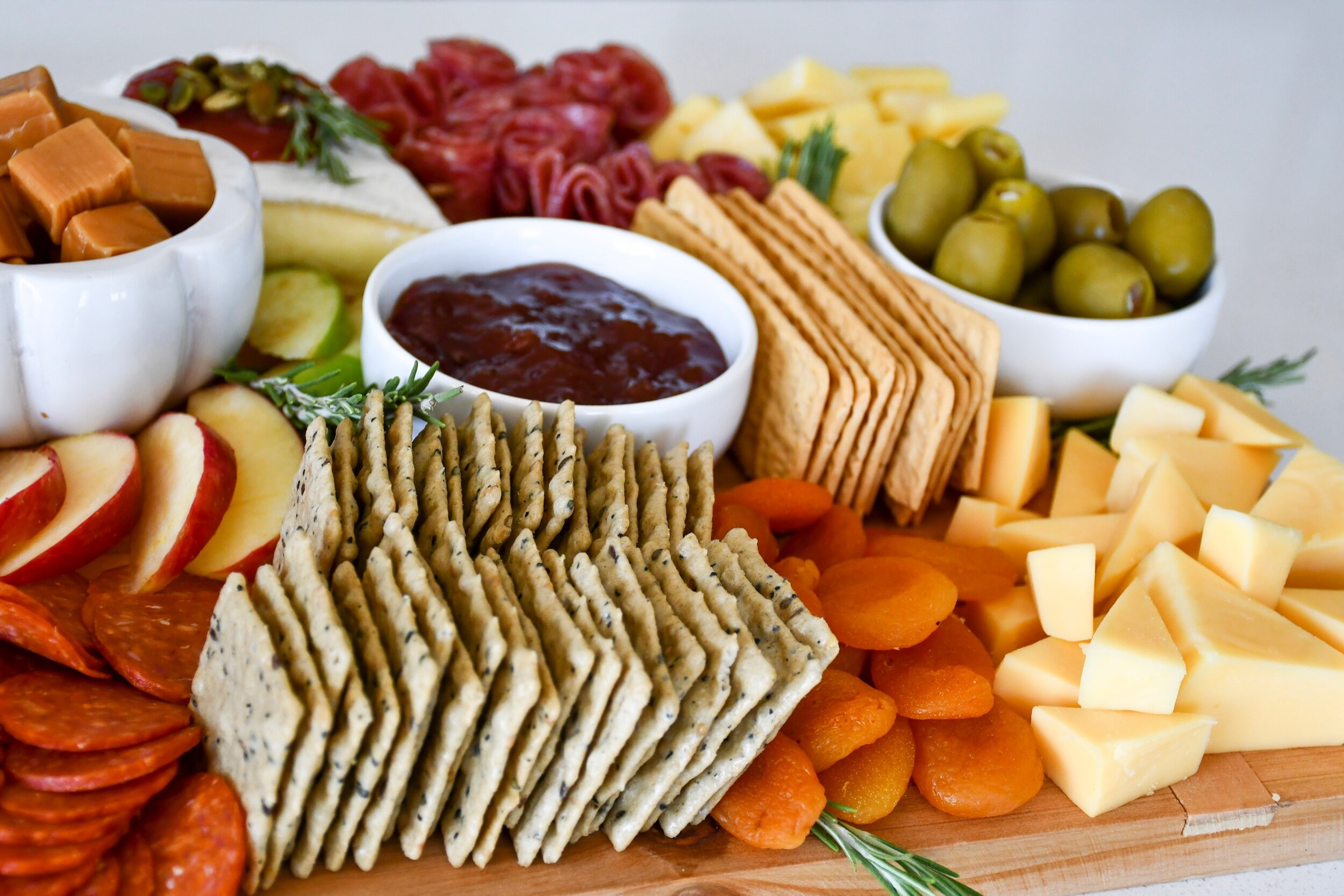 Fall Inspired Charcuterie Board | tarynintotravel.com |  #cheeseboard #partyfood #foodcenterpiece #charcuterieboard