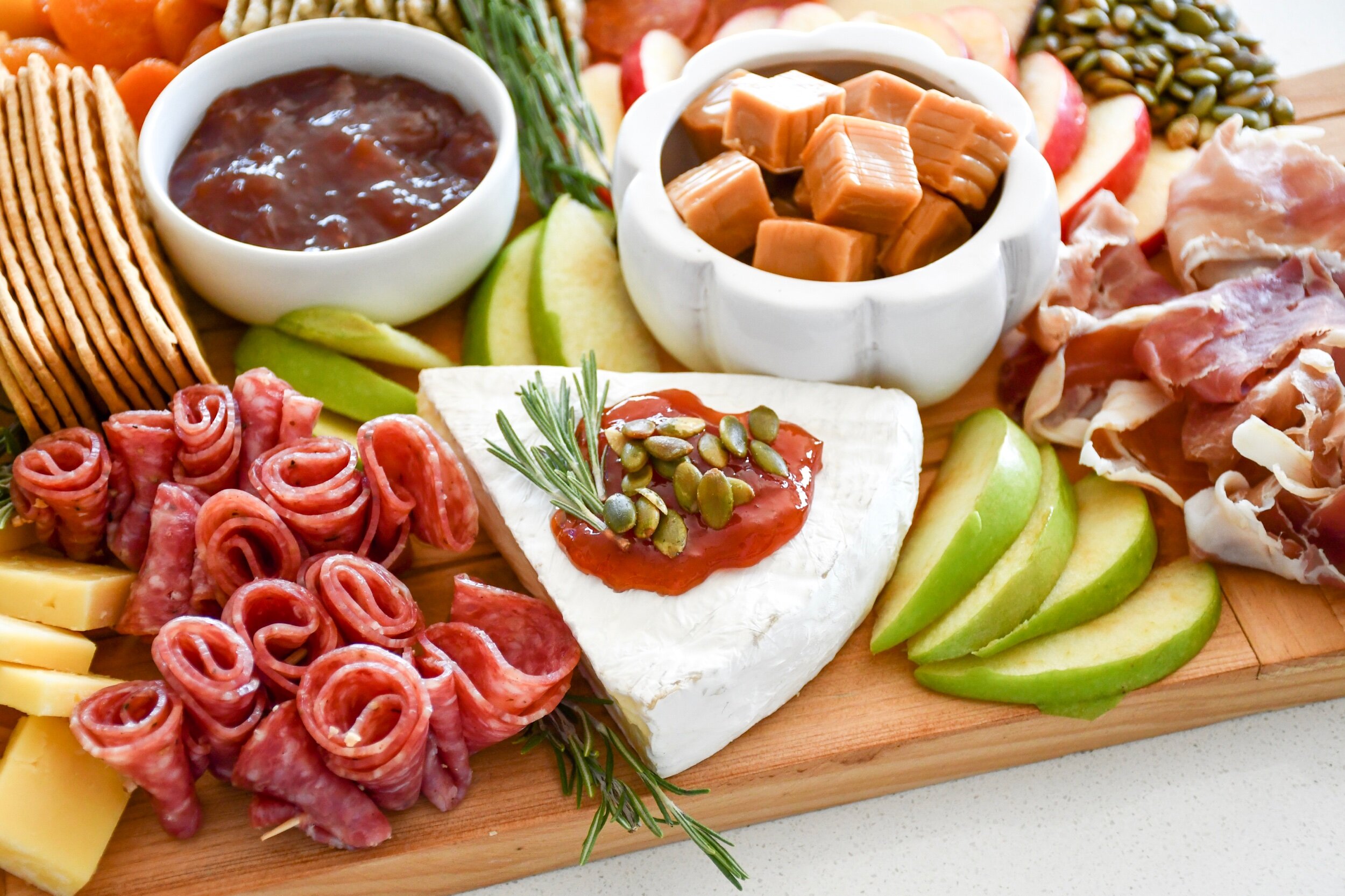 Fall Inspired Charcuterie Board | tarynintotravel.com |  #cheeseboard #partyfood #foodcenterpiece #charcuterieboard