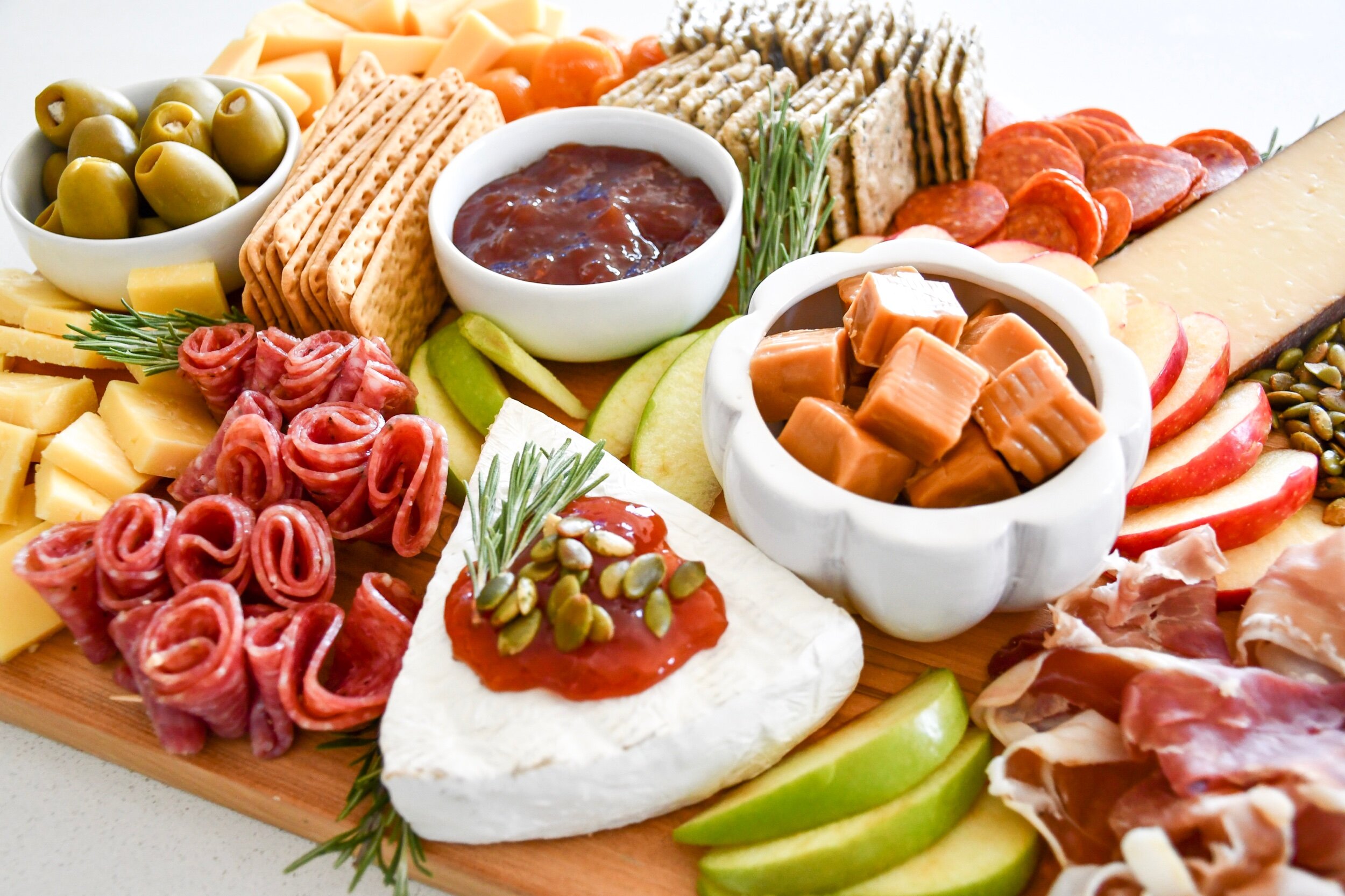 Fall Inspired Charcuterie Board | tarynintotravel.com |  #cheeseboard #partyfood #foodcenterpiece #charcuterieboard