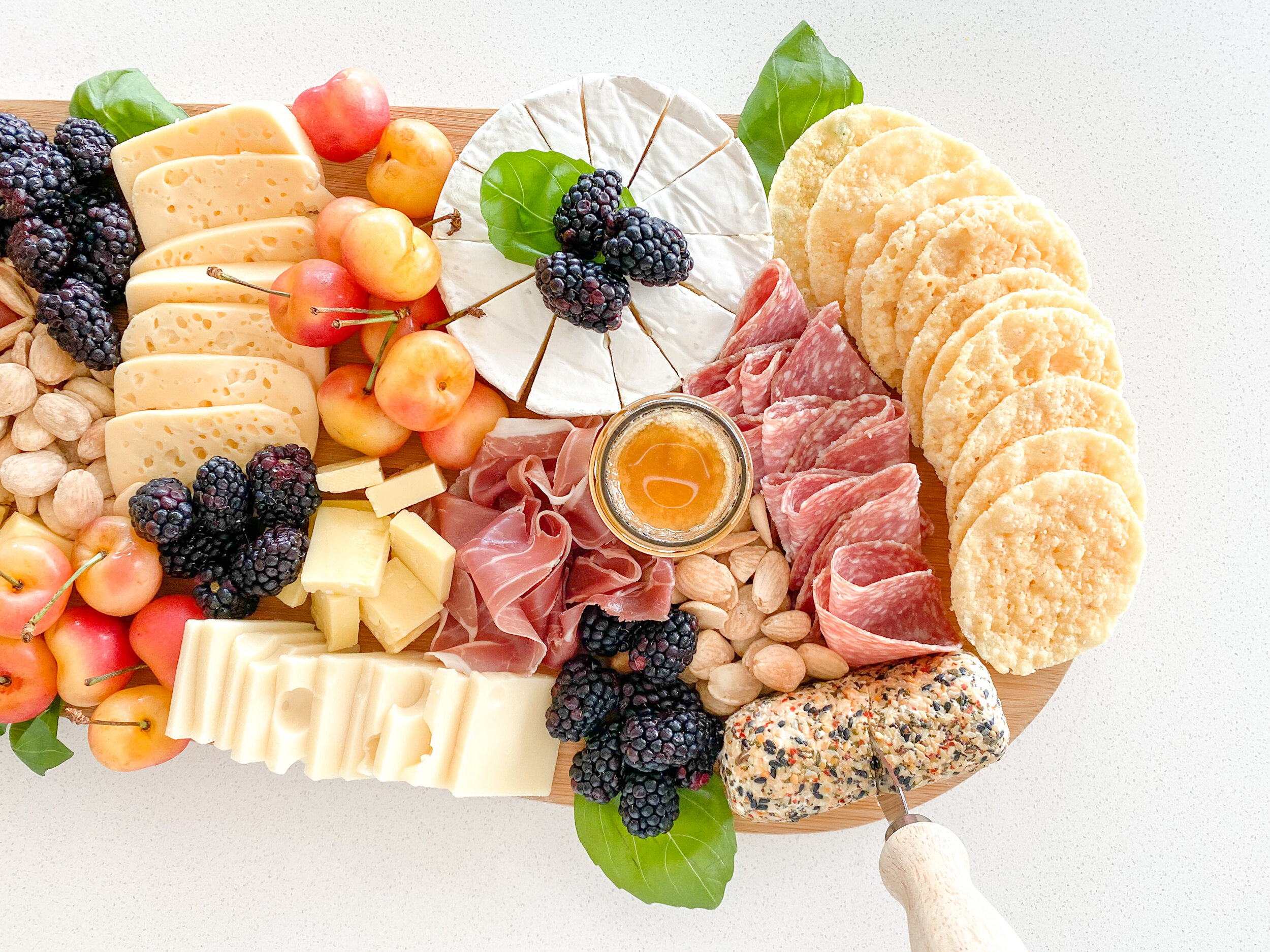 www.tarynintotravel.com | Summer Inspired Charcuterie Board | Cheese Board | Meat and Cheese | Fruit | Cheese Honey | Easy Charcuterie Board