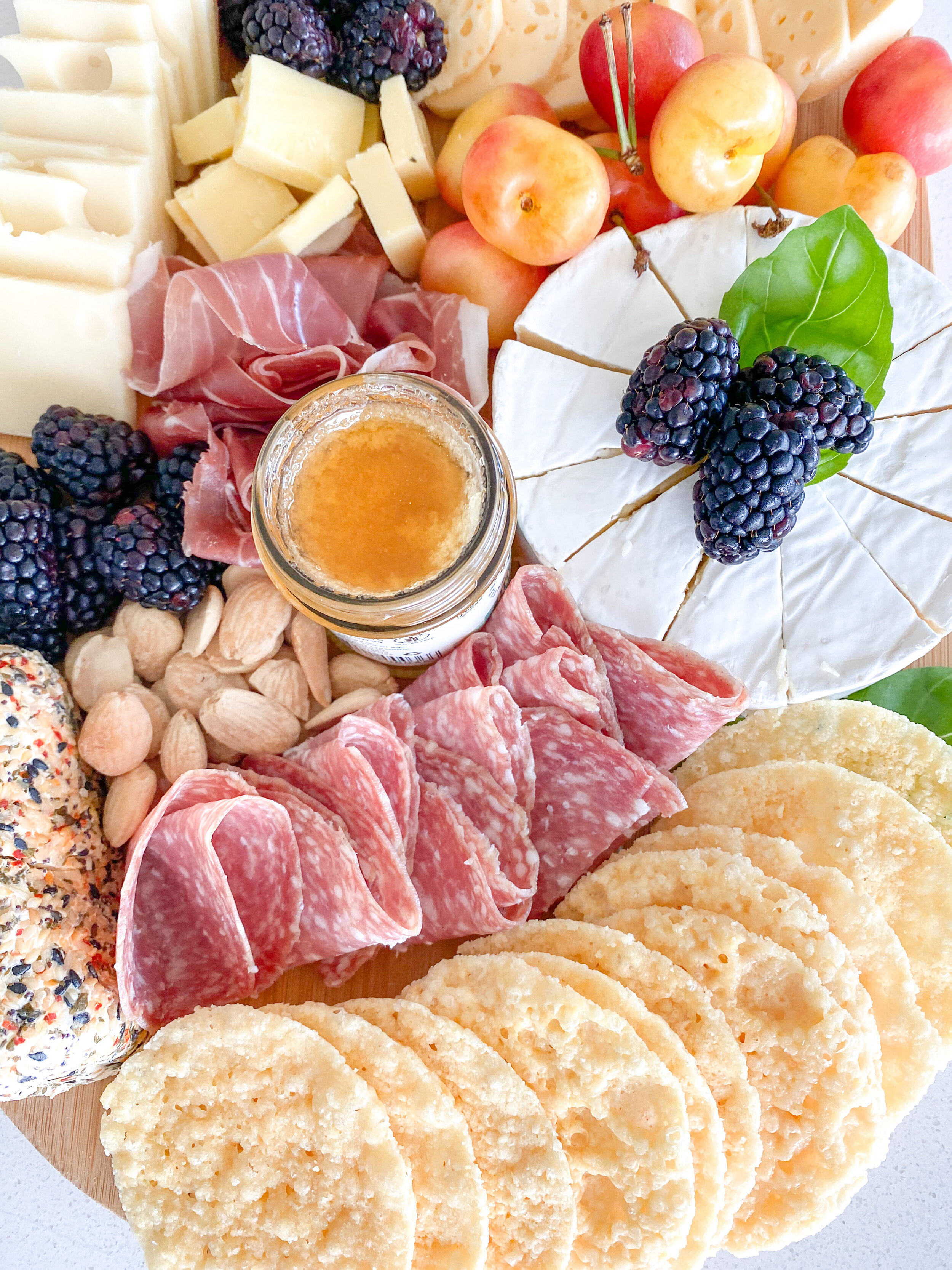 www.tarynintotravel.com | Summer Inspired Charcuterie Board | Cheese Board | Meat and Cheese | Fruit | Cheese Honey | Easy Charcuterie Board