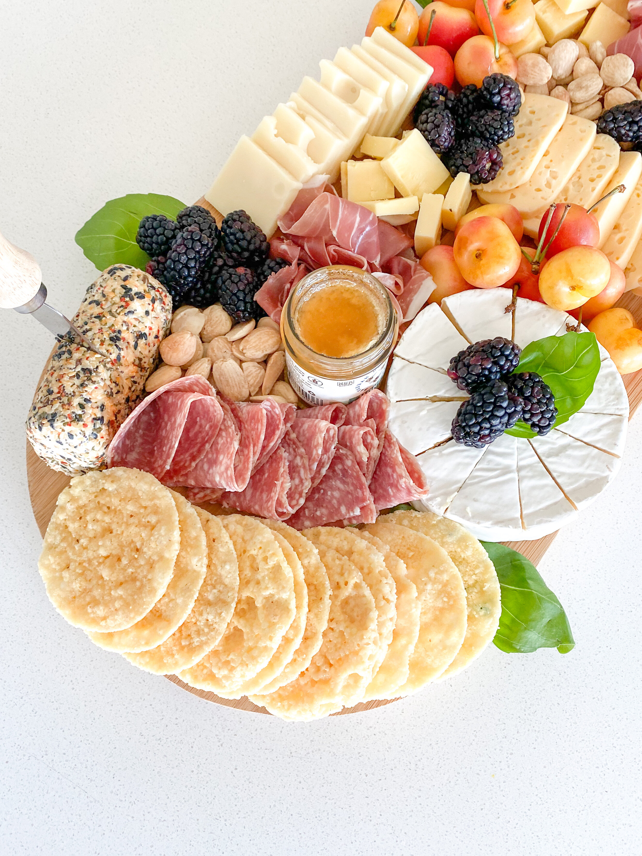 www.tarynintotravel.com | Summer Inspired Charcuterie Board | Cheese Board | Meat and Cheese | Fruit | Cheese Honey | Easy Charcuterie Board