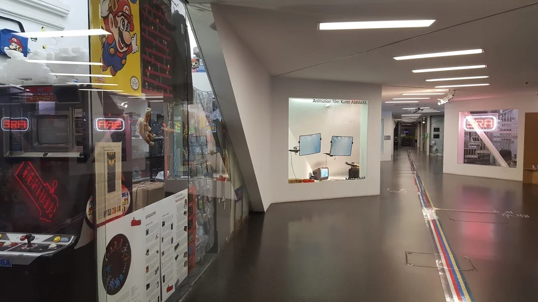 Inside the old, beautiful architecture is a completely revamped with modern office and gallery space rented by dozens of small media and tech companies as artists and print companies.
