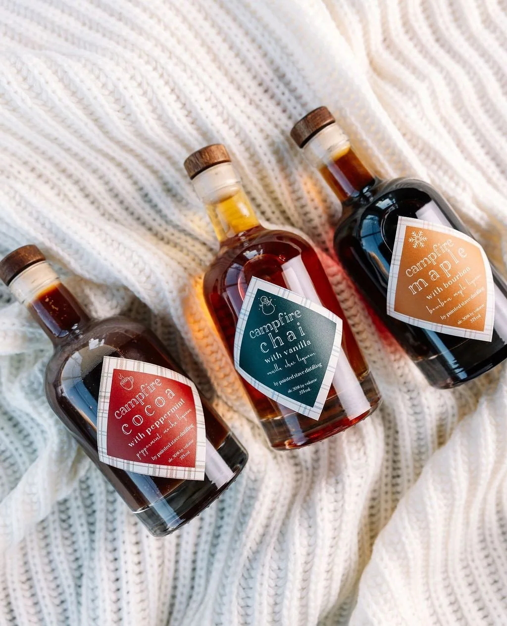 The coziest gift around ❄️ The Holiday Campfire Collection is here,  but moving out the door pretty quickly! Available as minis in a gift box, or as fully sized 375 ml. bottles, there's really something for everyone. ⁠
⁠
Shop via the link in our bio!