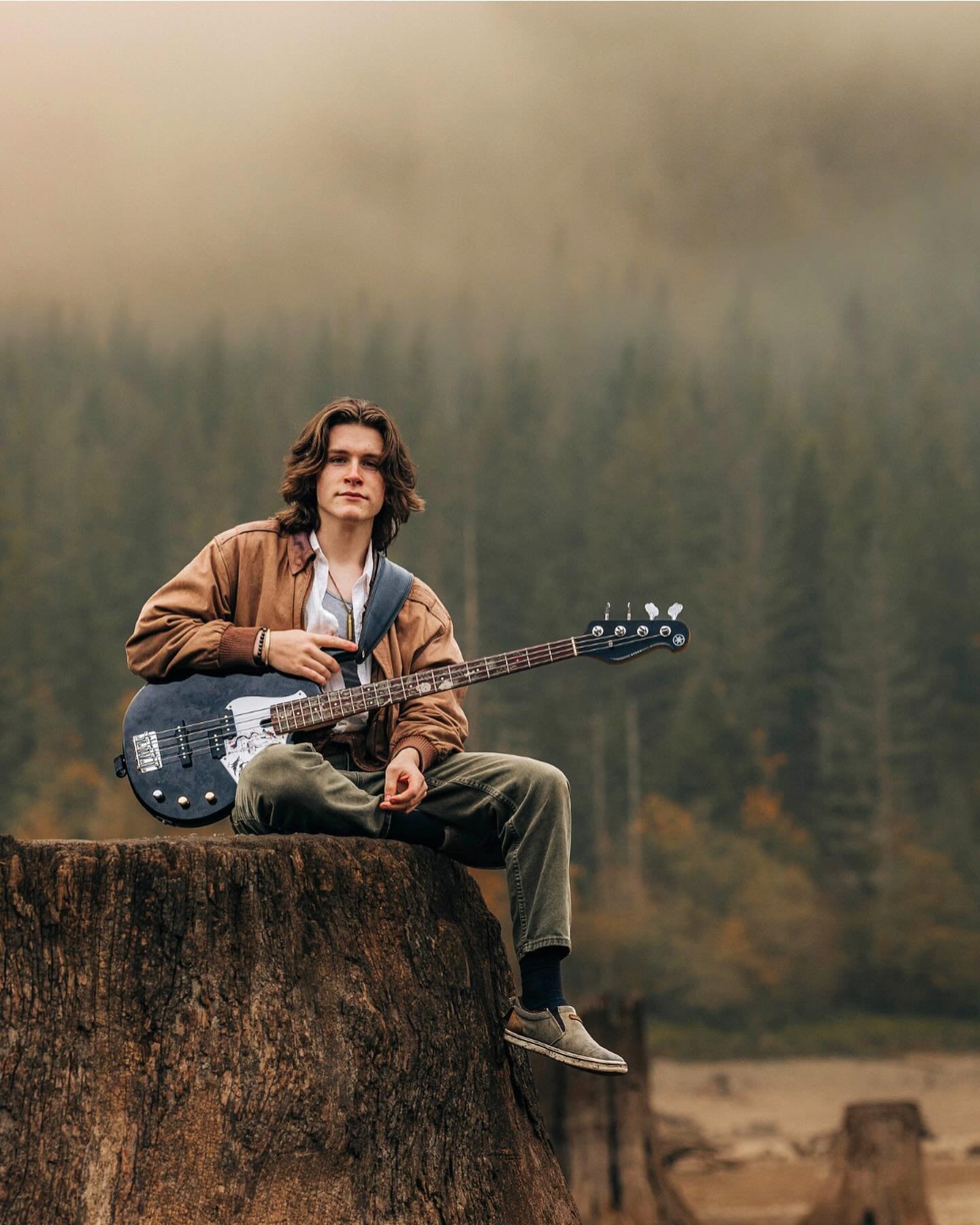 This shoot felt like a movie scene- classic PNW trees drenched in fog, a killer guitar, gorgeous greenery, favorite books and old HS assignments - EPIC!  And the cred all goes to this talented and creative guy who had the coolest vision of bringing h