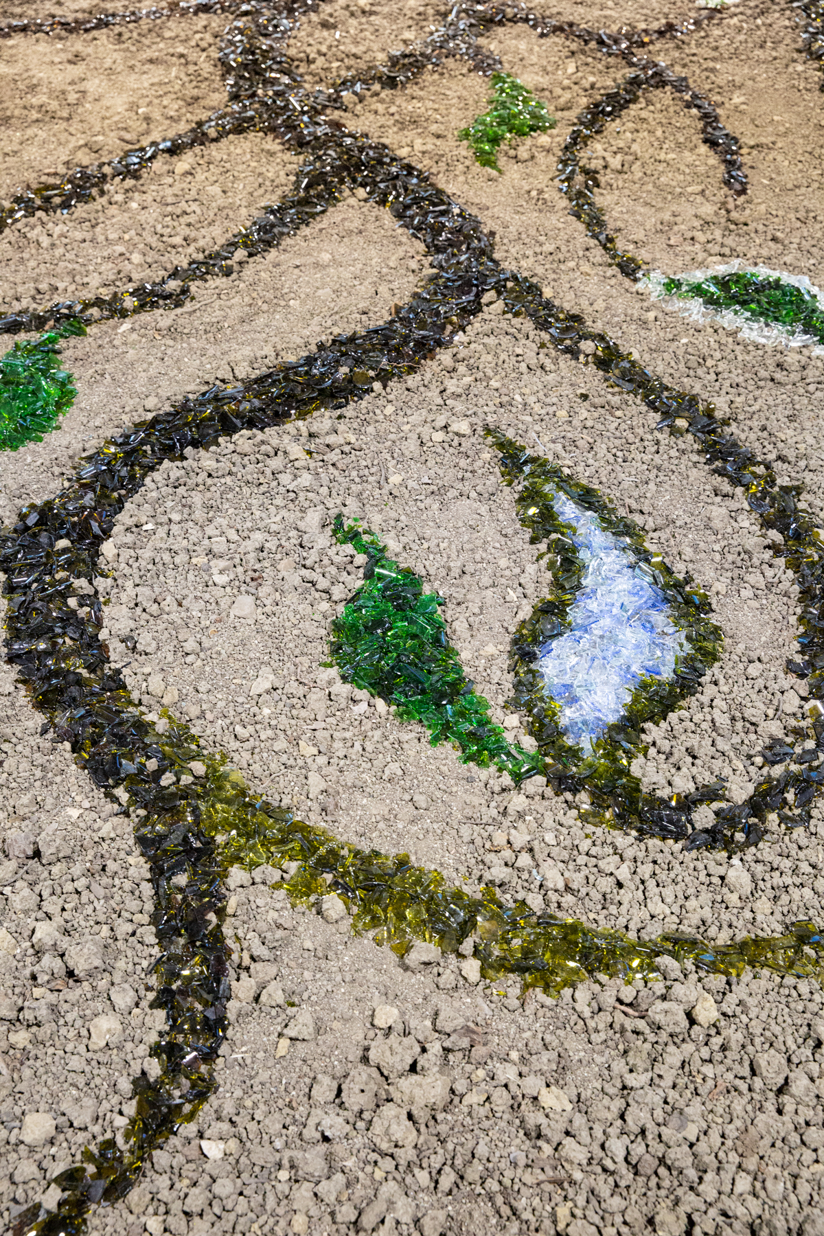  2018, Dirt, broken wine and beer bottles, Iranian female hair, , artist hair, 20 ft x 12 ft x 1 ft 