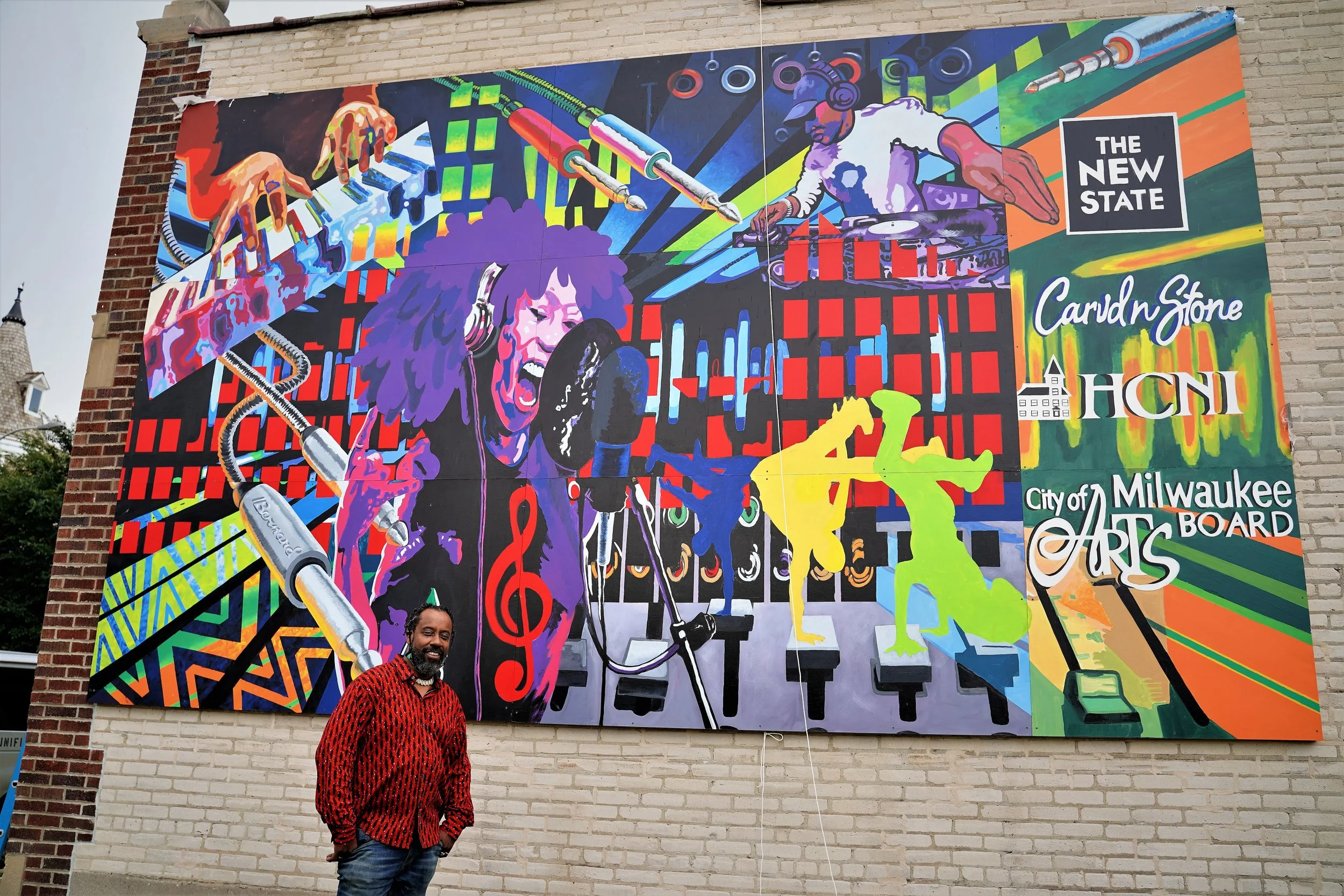 Brad Bernard in front of New State Mural