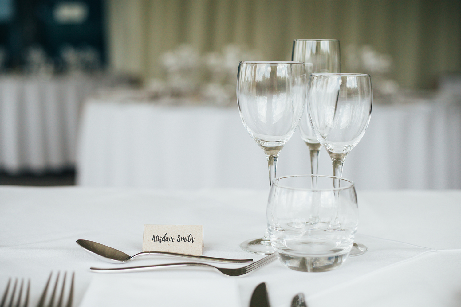 Wine glasses on wedding dining table