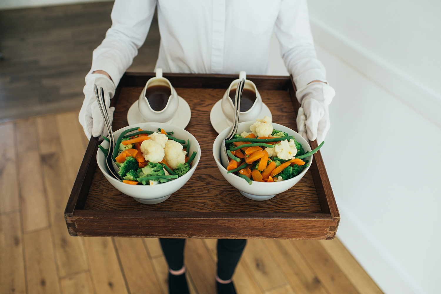 Wedding meal being served from a tray