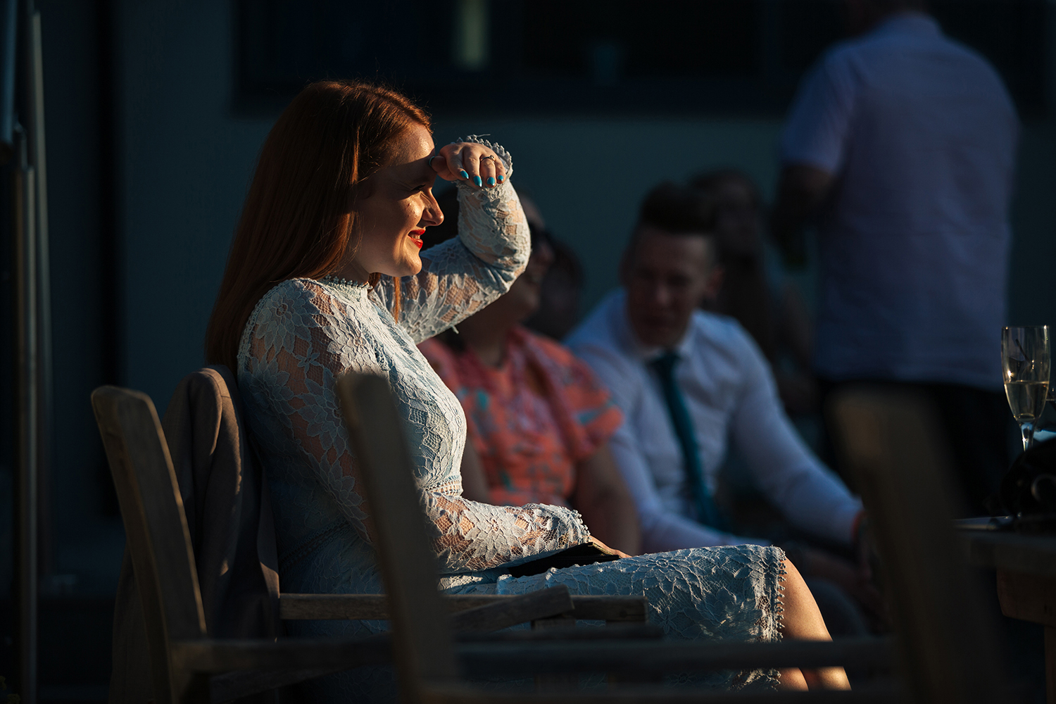 Lady in evening sun light at the wedding
