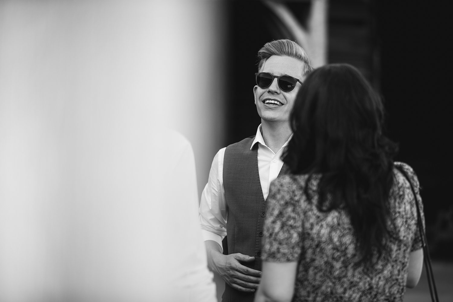 Wedding guests laughing