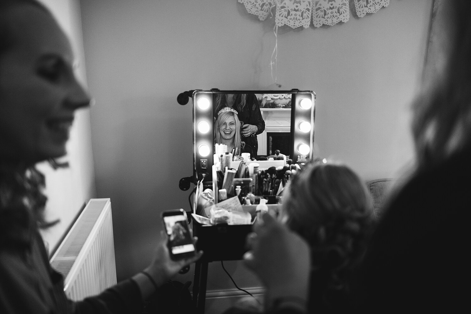 Bride having her hair and make up done