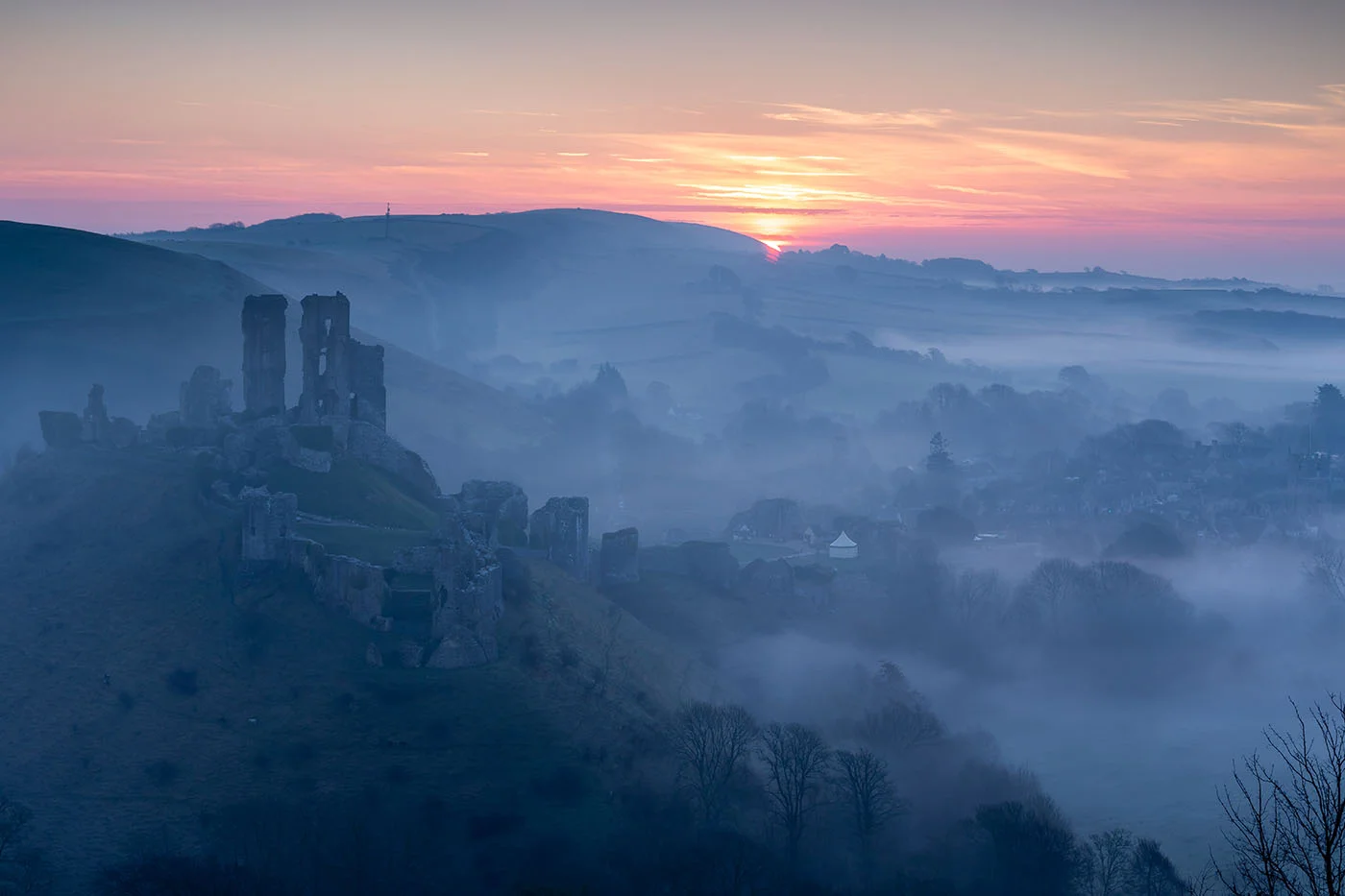 Corfe Castle Sun Peaking.jpg
