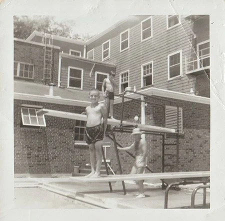  This photo, courtesy of Pam Brownlee, shows the “high dive” and “low dive” at the Y pool, before it was enclosed and the diving boards removed. 