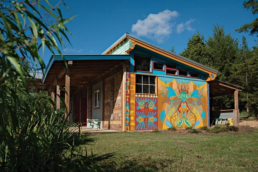 Former artist in residence Julia Reyes painted a portion of the art gallery building on MacGown’s property.
