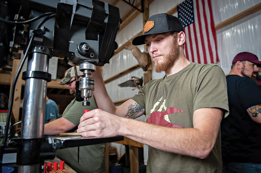  An Apex Ammunition employee operates equipment during the manufacturing process at the company’s original location. The ammunition company has contracted to purchase the former Maxxim Medican building near the intersection of Hwy. 69 and Yorkville Road in Columbus 