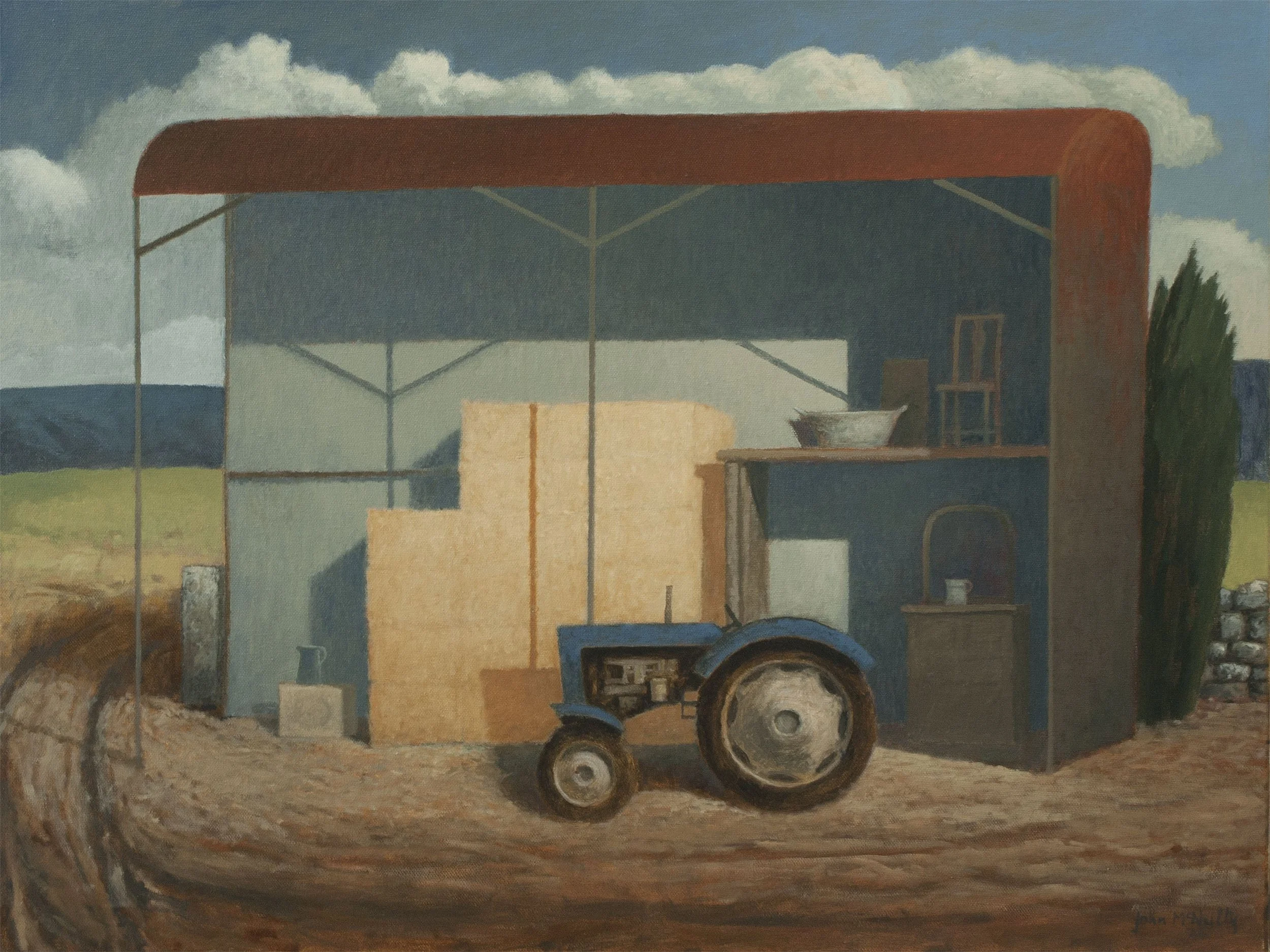 Blue tractor and hay