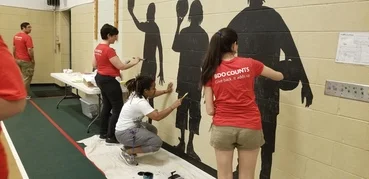2018 BDO Counts Day working on murals.jpg