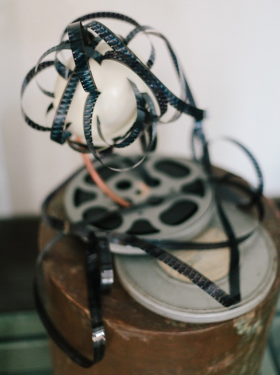 The Seven Fine Arts: Cinema, 2016 Mixed media: copper support, copper tube, film with reel and metal container, egg shell 67 x 40 x 40 cm